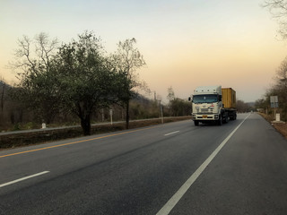Truck on road container, transportation concept.Speed fast motion blurred Transporting Land transport on the expressway