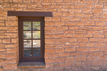 Fototapeta na wymiar Old Southwestern Adobe Wall and Window Wall and Window