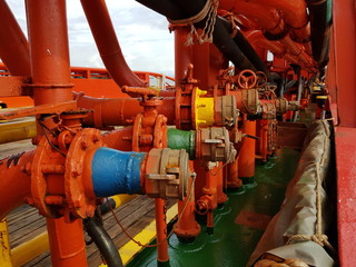 Manifold with pipes and valves on a supply boat