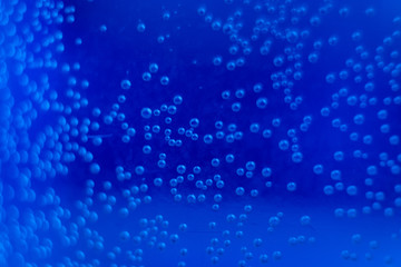 Blue bubbles close up macro shot.