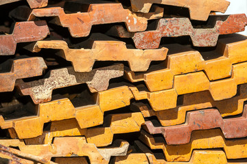 Stack of Old Orange Roof Tiles for construction