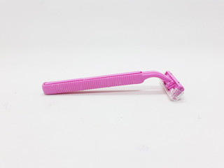 Bright Colorful Handheld Used Pink Razor Blade for Cutting Beard Hair Tools in White Isolated Background