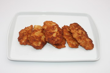 Putenschnitzel in Kokospanat
