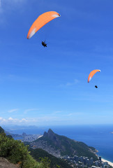 Paragliders flying over Morro Dois Irmãos, Rio de Janeiro