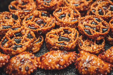 Cartellate, a delicious traditional pastry from Puglia, filled with fig syrup