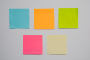 colorful sticky notes on white wall 