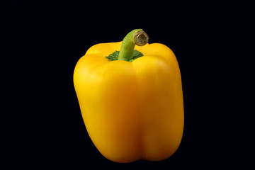 Close up yellow sweet pepper on black background have path