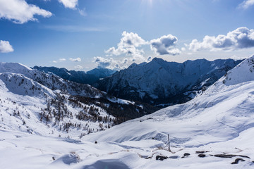 Fototapeta na wymiar The snowy mountains, the nature and the landscape of the Valtellina after the first snowfall of the season in the Alps, near the town of Tartano, Italy - November 2019.