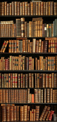 old books on wooden shelf