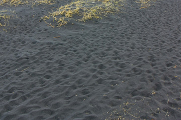 The texture of the black sand beach in Iceland