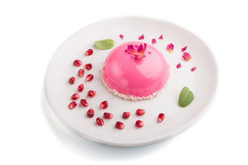 Fototapeta premium Pink mousse cake with strawberry isolated on white background. top view.