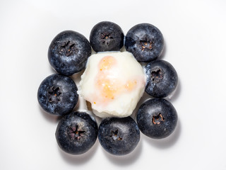 Blueberry and blueberry yogurt center on white background 