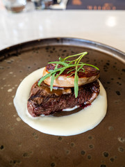 Beef steak top with foie gras