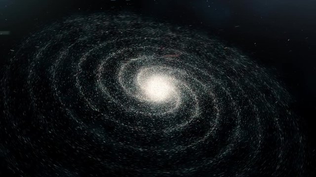 Abstract animation of spiral galaxy rotation in space with billion of stars on the black background. Animation. Particles glowing background
