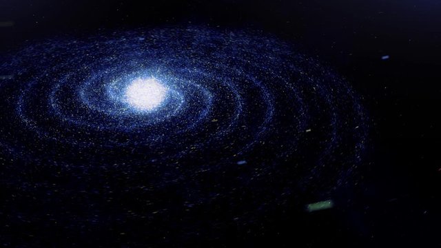 Beautiful abstraction of colorful spiral galaxy rotation in space with billion of stars on the black background. Animation. Particles glowing background