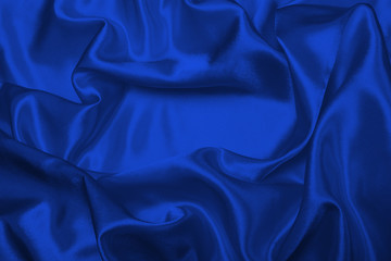 Blue abstract silk fabric background.