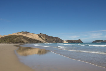 Fototapeta na wymiar The remote Te Werahi Beach and Cape Maria Van Dieman.on the Cape Reinga in Northland, New Zealand.