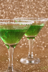 Glasses with a green cocktail