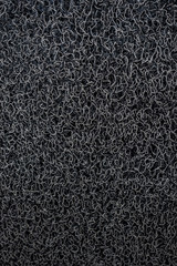 Background of black coil car floor mat  texture