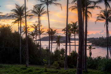 Sunset over the ocean bay in Sri Lanka