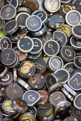 Close-up of different old, antique typewriter keys