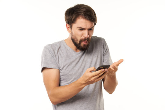 young man with mobile phone - Powered by Adobe