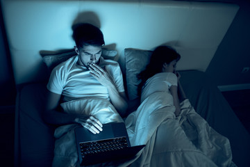 man and woman in hotel room