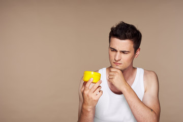 Fototapeta premium young man drinking orange juice