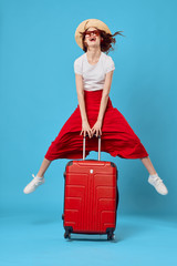 young woman with suitcase