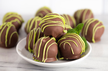 Pile of Chocolate Covered Green Striped Mint Truffles