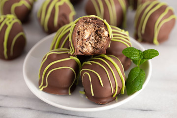 Pile of Chocolate Covered Green Striped Mint Truffles