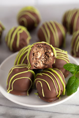 Pile of Chocolate Covered Green Striped Mint Truffles