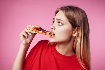 portrait of young woman eating cake