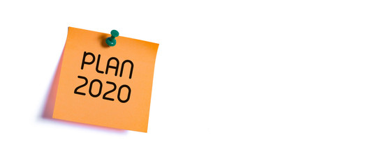 plan new year 2020 on the orange sticky note