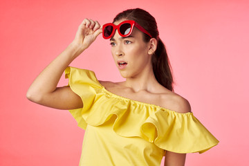woman in summer dress with sunglasses