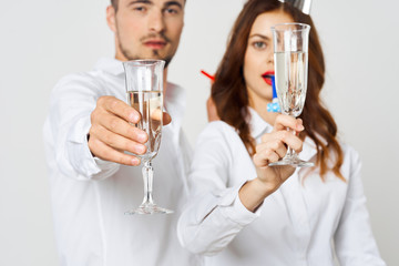 man and woman with champagne