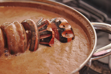 Making a traditional mexican chocolate with a molinillo