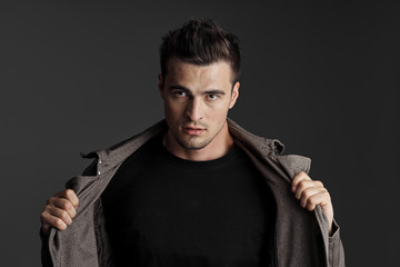 young man with a gun