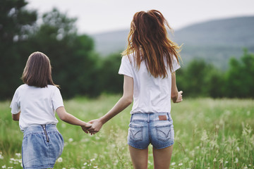 Fototapeta premium mother and daughter in the park