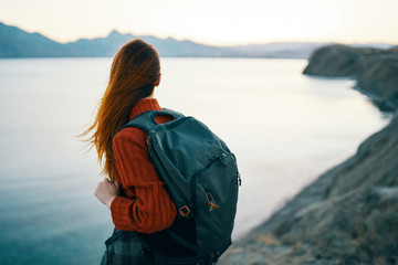 young woman in mountains