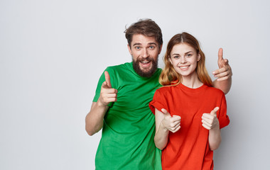 happy couple with thumbs up