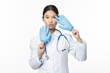 Fototapeta premium young doctor with stethoscope isolated on white