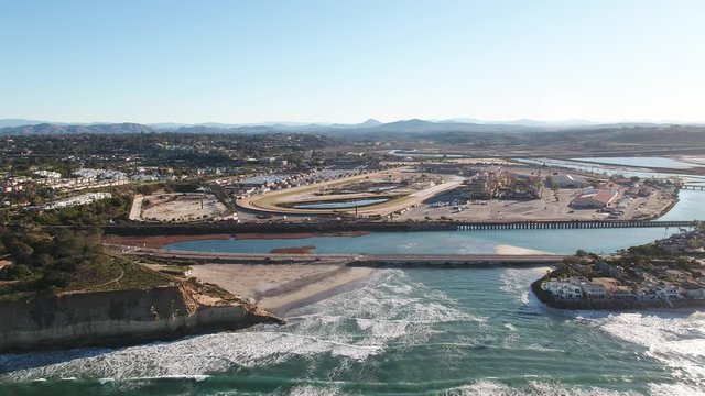 Del mar beach and racetrack aerial sunrise Inspire 2 H.264 Zoom out and flying backward motion. medium to High angle. San Diego, California
