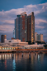 Fototapeta na wymiar Buildings along Manila Bay in Ermita, Manila, The Philippines