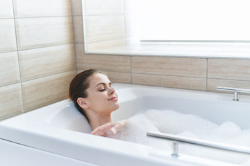 young woman in bathroom