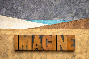 imagine concept in wood type and handmade paper - obrazy, fototapety, plakaty
