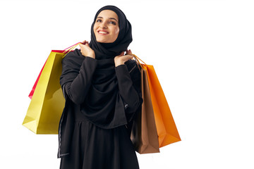 young woman with shopping bags