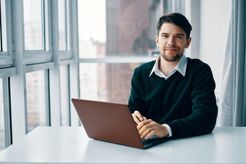 businessman working on laptop in office