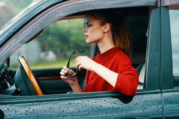 young woman in car