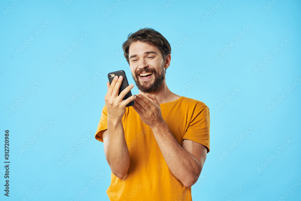 Poster young man talking on cell phone